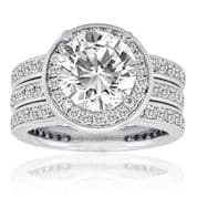 A white gold engagement ring set with a round cut diamond.