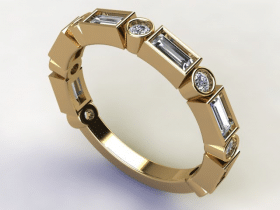 A gold ring with five baguetts of diamonds
