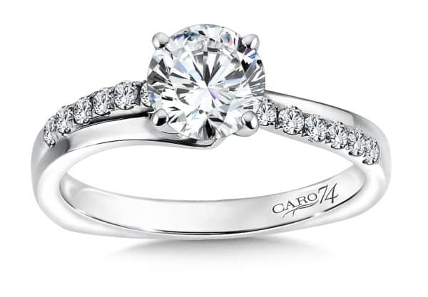 An oval diamond engagement ring in white gold.