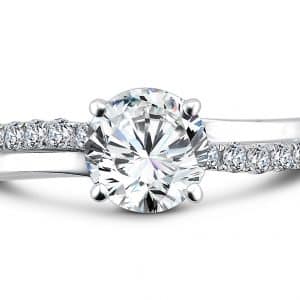 An oval diamond engagement ring in white gold.