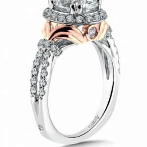 A rose and white gold engagement ring with diamonds.