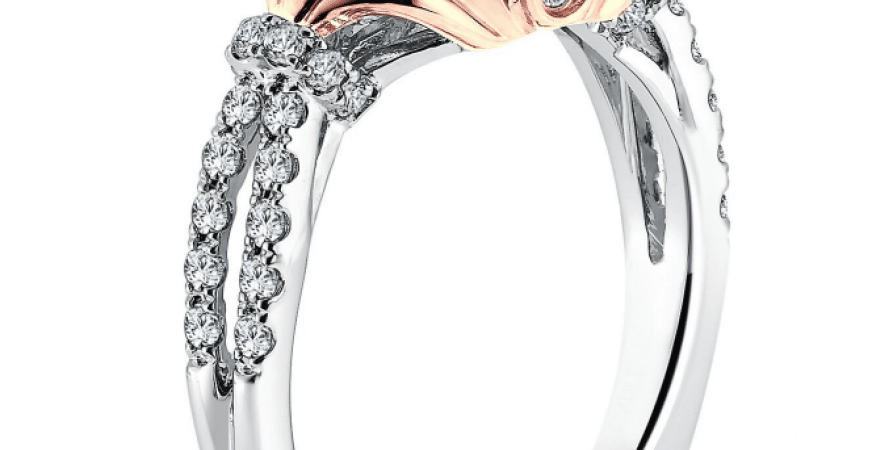 A rose and white gold engagement ring with diamonds.