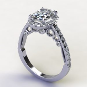 An oval diamond engagement ring with a halo.