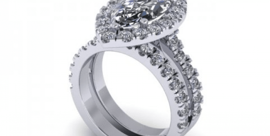 A white gold engagement ring set with a pear shaped diamond.