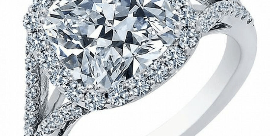 A pear - shaped diamond engagement ring in white gold.