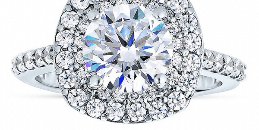 A diamond ring with a halo of diamonds around it