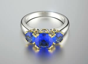 elegant sapphire ring on a gray background