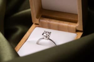 a jewelry box with diamond engagement ring
